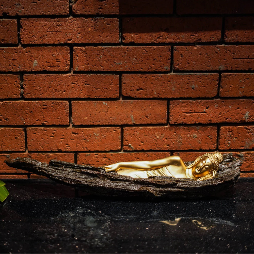 Sleeping buddha on tree bark figurine