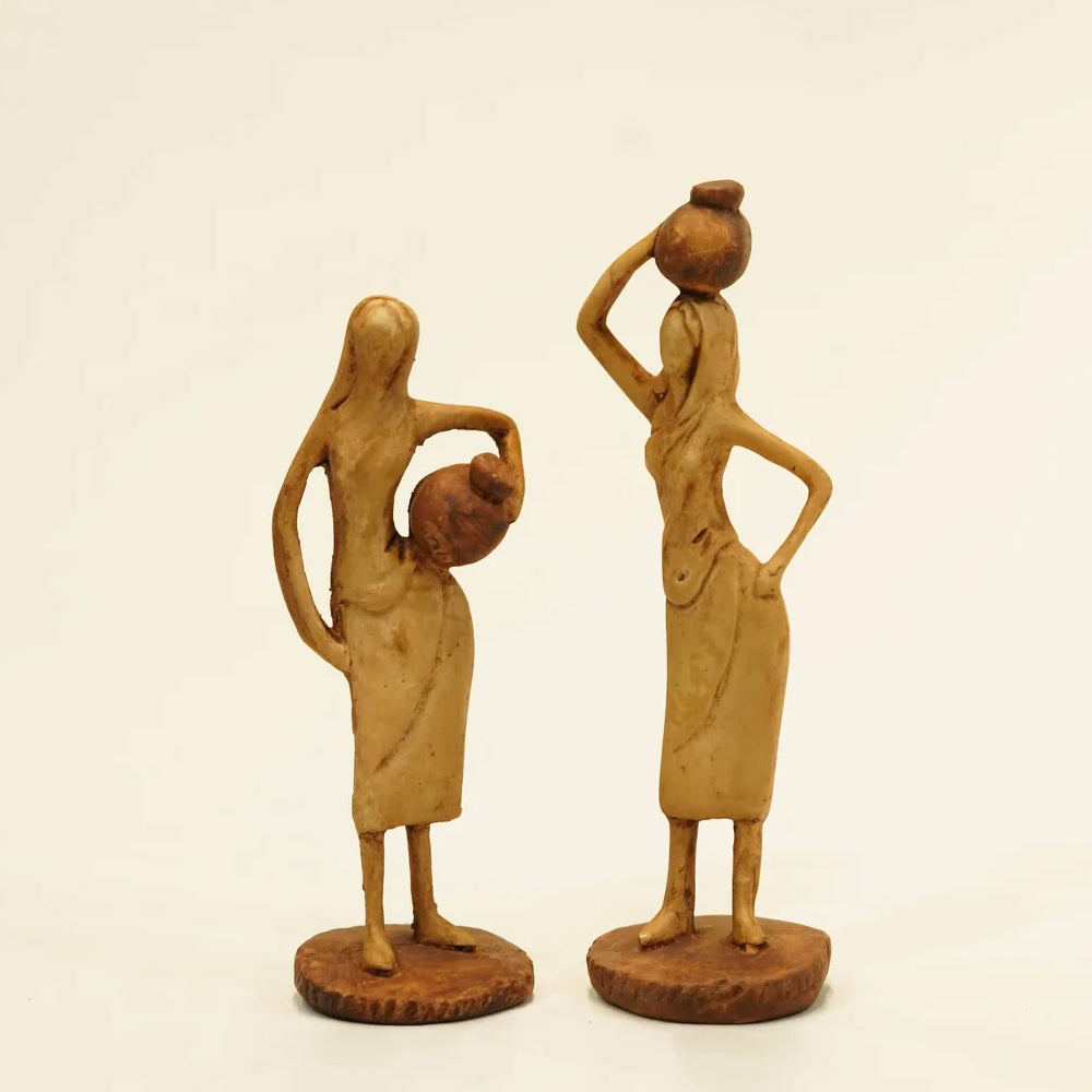 ABSTRACT VILLAGE POT LADY STATUE