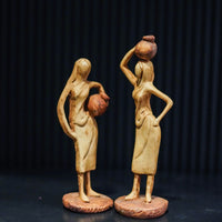 ABSTRACT VILLAGE POT LADY STATUE