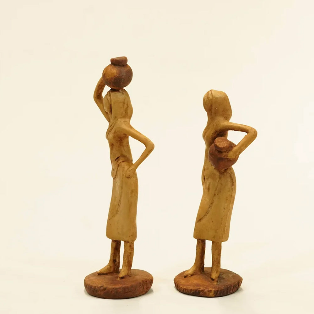 ABSTRACT VILLAGE POT LADY STATUE