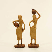 ABSTRACT VILLAGE POT LADY STATUE